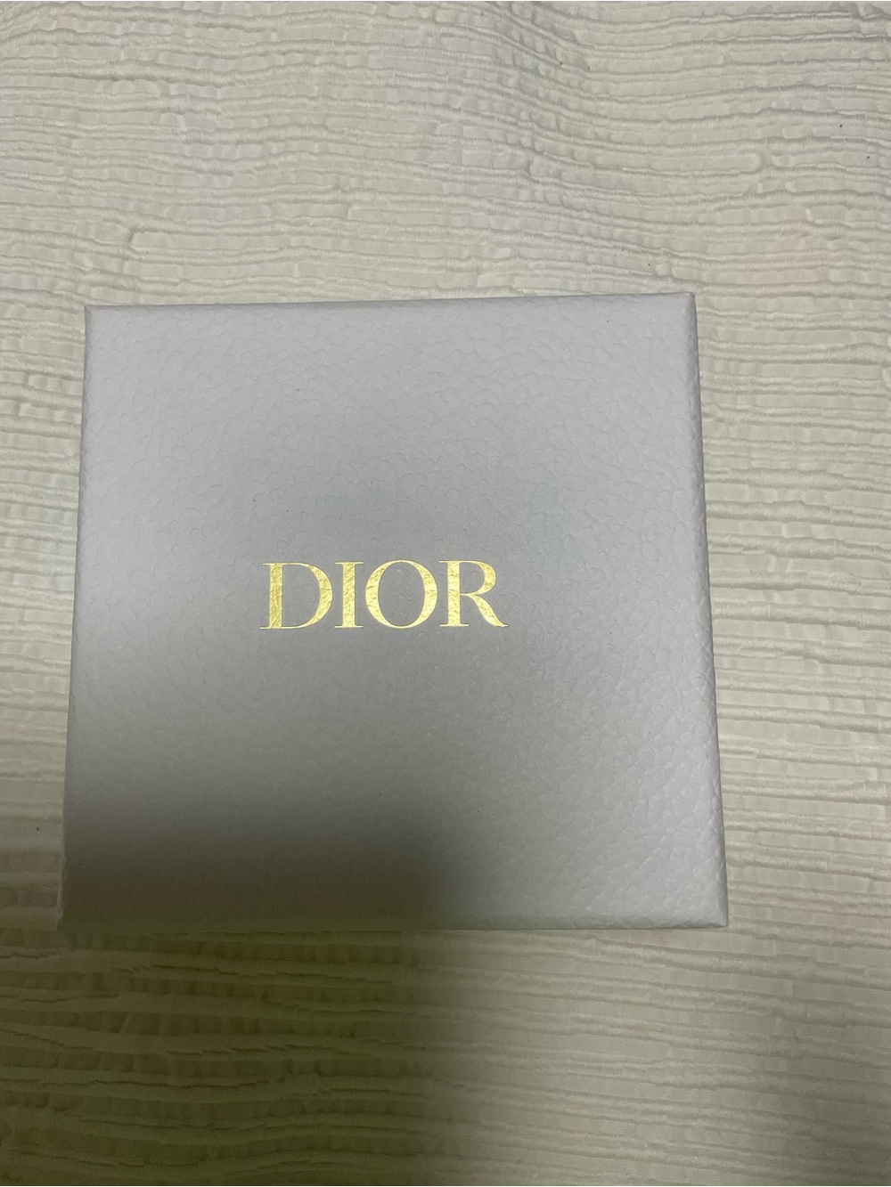Dior White Box Art with Gold Logo Accent